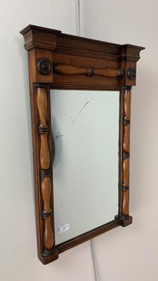 Lot 275 - A STAINED WOOD RECTANGULAR WALL MIRROR