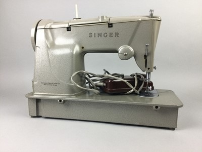 Lot 279 - A CASED SINGER SEWING MACHINE
