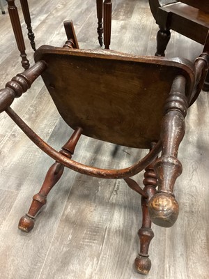 Lot 780 - A 19TH CENTURY WINDSOR ELBOW CHAIR
