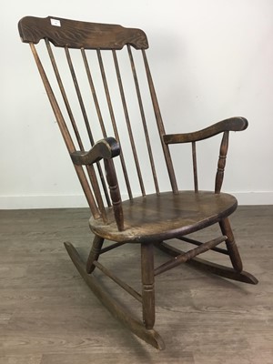 Lot 191 - A STAINED BEECH ROCKING CHAIR