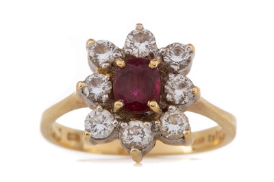 Lot 406 - A RUBY AND DIAMOND CLUSTER RING
