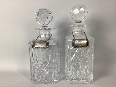 Lot 197 - A PAIR OF DECANTERS WITH SILVER LABELS