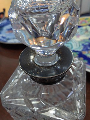Lot 101 - A SILVER COLLARED DECANTER AND STOPPER