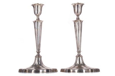 Lot 103 - A PAIR OF EDWARD VII SILVER CANDLESTICKS