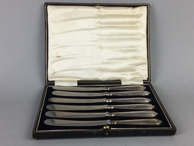 Lot 383 - A SET OF SIX BUTTER KNIVES WITH SILVER MOUNTED HANDLES AND PLATED CUTLERY