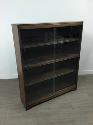 Lot 431 - AN OAK GLAZED DOOR BOOKCASE AND A COFFEE TABLE