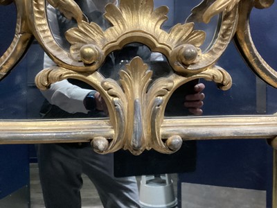 Lot 717 - A LARGE GILT GESSO WALL MIRROR