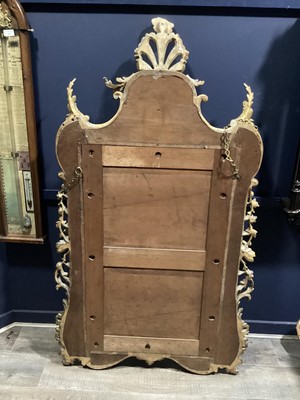 Lot 717 - A LARGE GILT GESSO WALL MIRROR