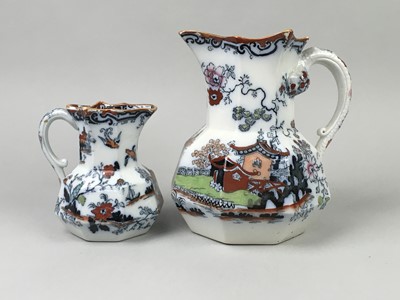 Lot 46 - A PAIR OF COPPER LUSTRE JUGS ALONG WITH OTHER JUGS
