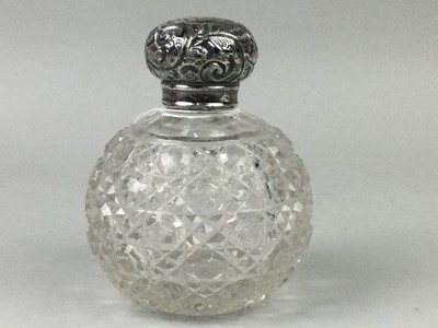 Lot 26 - A SILVER TOPPED VANITY JAR
