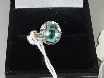 Lot 17 - A TOPAZ AND DIAMOND RING