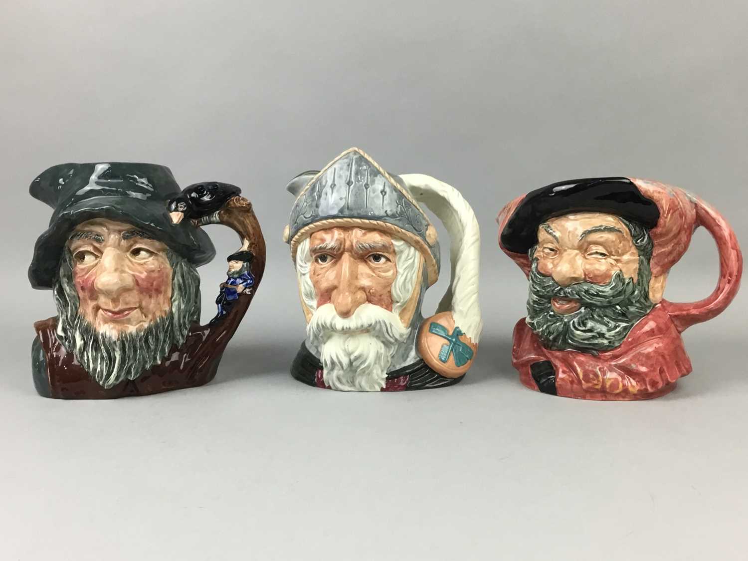 Lot 117 - A LOT OF THREE ROYAL DOULTON CHARACTER JUGS