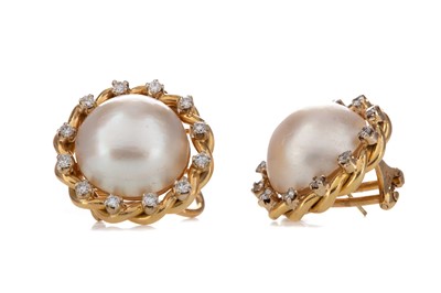 Lot 519 - A PAIR OF MABE PEARL AND DIAMOND EARRINGS