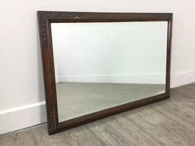 Lot 256 - AN OAK FRAMED RECTANGULAR WALL MIRROR AND AN OVAL FRAMED MIRROR