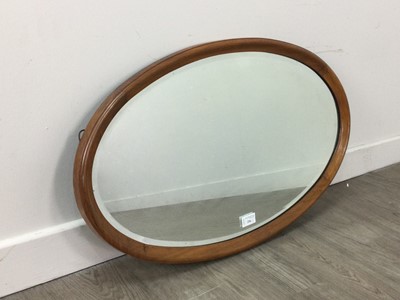 Lot 256 - AN OAK FRAMED RECTANGULAR WALL MIRROR AND AN OVAL FRAMED MIRROR