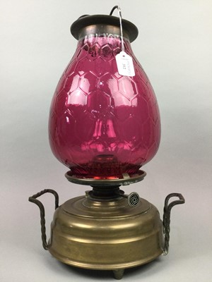 Lot 312 - A LATE VICTORIAN BRASS OIL LAMP