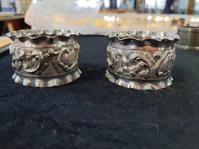 Lot 131 - A SET OF SIX VICTORIAN SILVER NAPKIN RINGS
