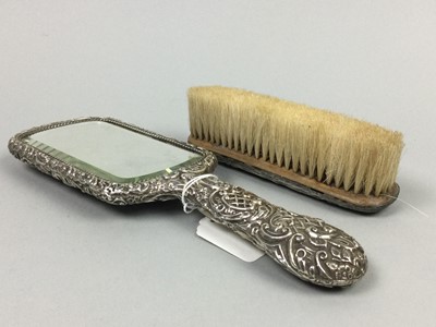 Lot 110A - A SILVER BACKED HAND MIRROR AND BRUSH
