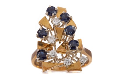 Lot 724 - A CONTEMPORARY SAPPHIRE AND DIAMOND RING