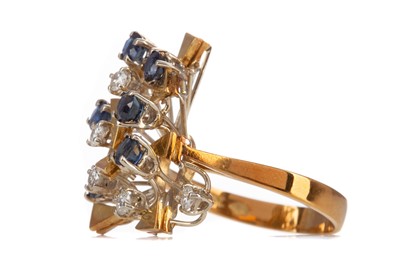 Lot 724 - A CONTEMPORARY SAPPHIRE AND DIAMOND RING