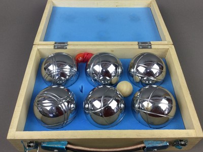 Lot 397 - A SET OF FOUR LAWN BOWLS