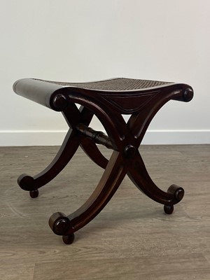 Lot 413 - A MAHOGANY CANE SEAT STOOL AND A MAHOGANY NEST OF TABLES