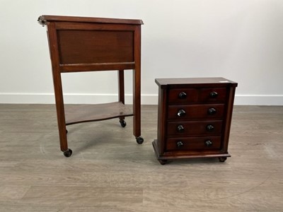 Lot 412 - A MAHOGANY APPRENTICE CHEST AND A SEWING TABLE