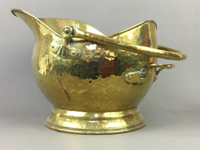 Lot 438 - A HAMMERED BRASS COAL SCUTTLE