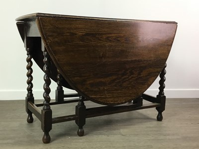 Lot 399A - AN OAK GATE LEG TABLE