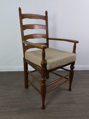 Lot 406A - AN OAK LADDER BACK OPEN ELBOW CHAIR