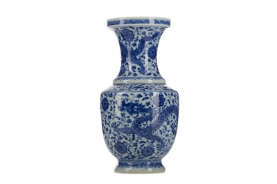 Lot 1128 - A CHINESE BLUE AND WHITE DRAGON AND LOTUS VASE