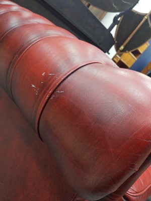 Lot 196 - A CHESTERFIELD OXBLOOD SETTEE
