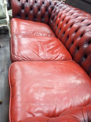 Lot 196 - A CHESTERFIELD OXBLOOD SETTEE