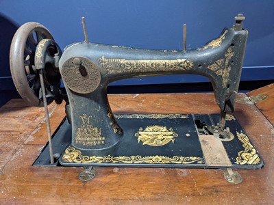 Lot 198 - A SINGER TREADLE SEWING MACHINE