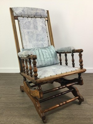 Lot 201 - AN AMERICAN SPRING ROCKING CHAIR