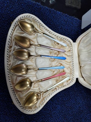 Lot 55 - A SET OF SIX NORWEGIAN SILVER GILT AND HARLEQUIN ENAMEL COFFEE SPOONS
