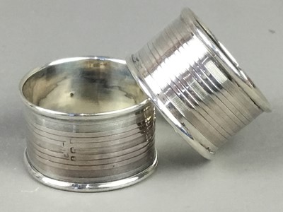 Lot 51 - A LOT OF FOUR SILVER NAPKIN RINGS