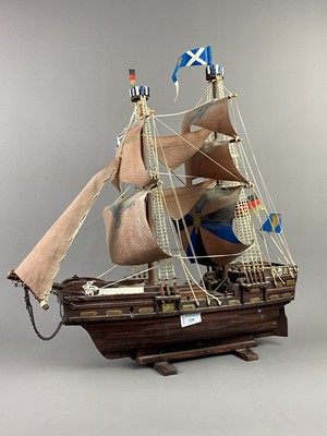 Lot 226 - A MODEL GALLEON ON A WOODEN STAND