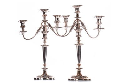 Lot 405 - A PAIR OF 19TH CENTURY OLD SHEFFIELD PLATE TWIN BRANCH CANDELABRA