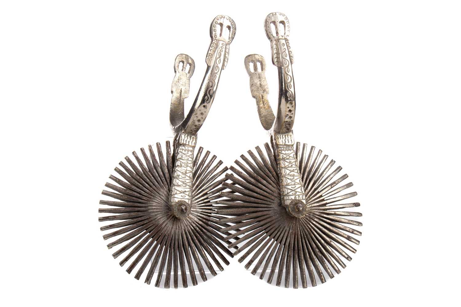 Lot 506 - A PAIR OF MEXICAN SILVERED IRON & BRASS SPURS