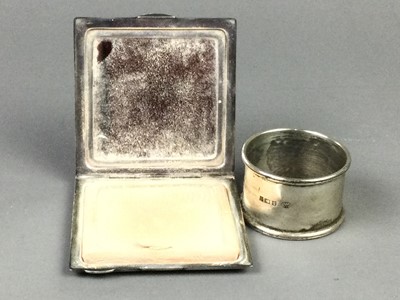 Lot 101 - A SILVER COMPACT AND NAPKIN RING