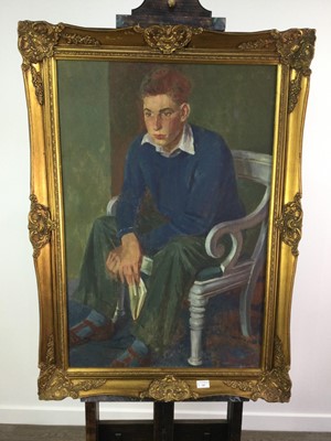 Lot 186 - AN OIL PAINTING OF A SEATED YOUNG MAN
