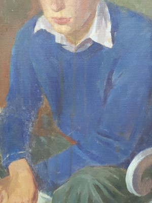 Lot 186 - AN OIL PAINTING OF A SEATED YOUNG MAN