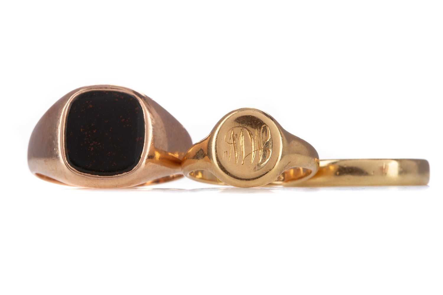 Lot 706 - TWO GOLD SIGNET RINGS AND A WEDDING BAND