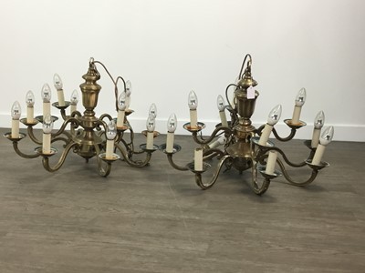 Lot 261 - A SET OF FOUR BRASS CHANDELIERS AND OTHER LIGHT PARTS