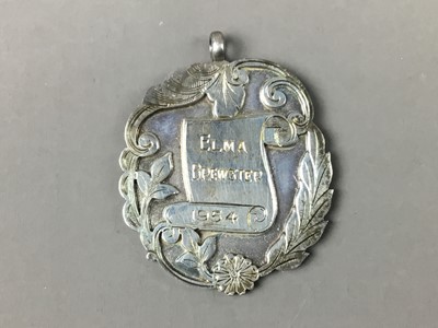 Lot 28 - A SILVER DUX MEDAL, ALONG WITH A SHOT GLASS HOLDER