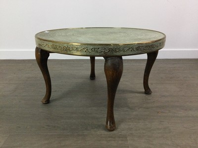 Lot 269 - A MIDDLE EASTERN BRASS TRAY TOP TABLE