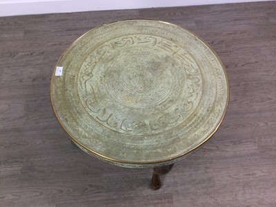 Lot 269 - A MIDDLE EASTERN BRASS TRAY TOP TABLE