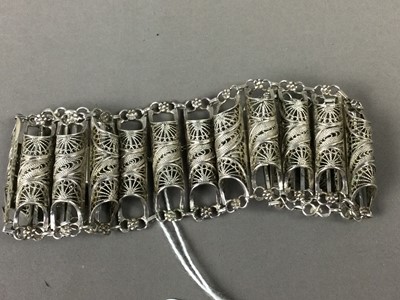 Lot 11 - AN EASTERN FILIGREE WHITE METAL BRACELET ALONG WITH OTHER JEWELLERY