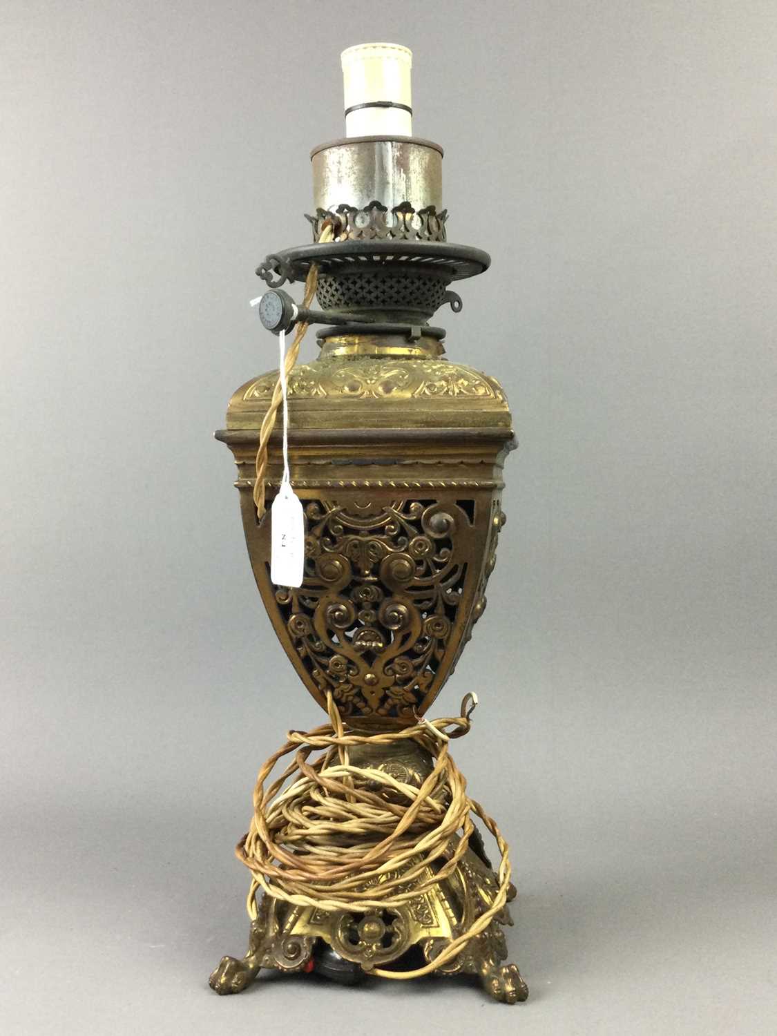 Lot 84 - A VICTORIAN GILDED BRASS OIL LAMP WITH BRASS CANDLESTICKS